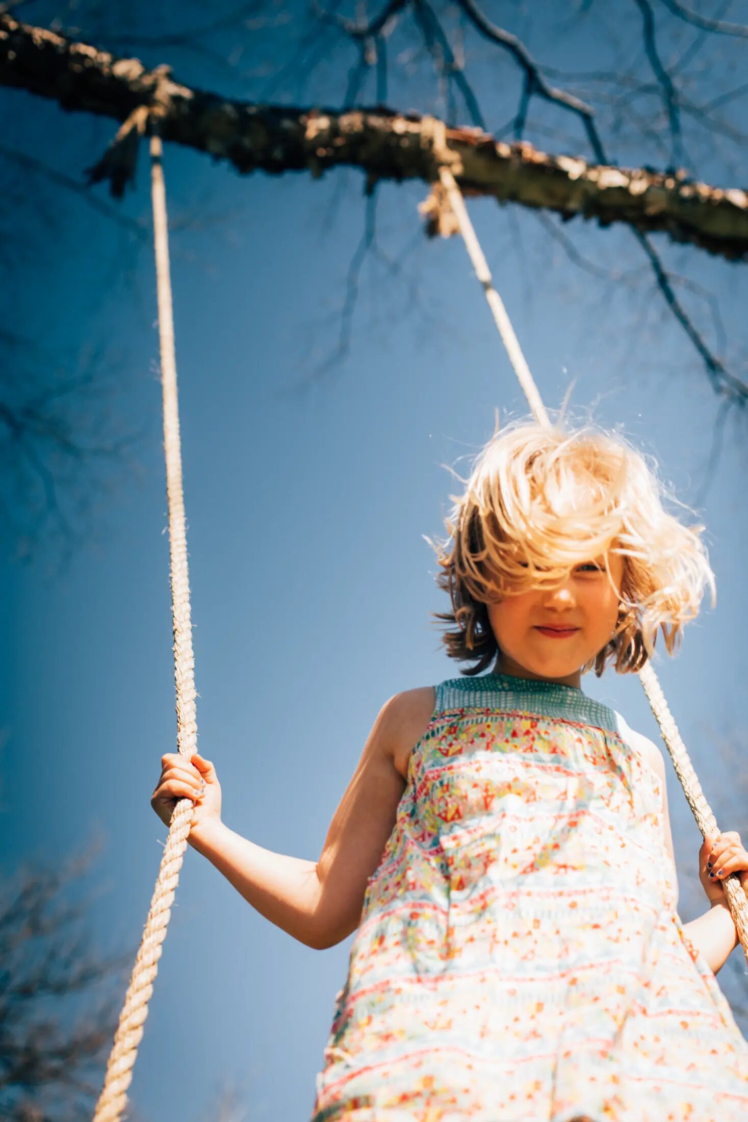 A child in motion on a swing