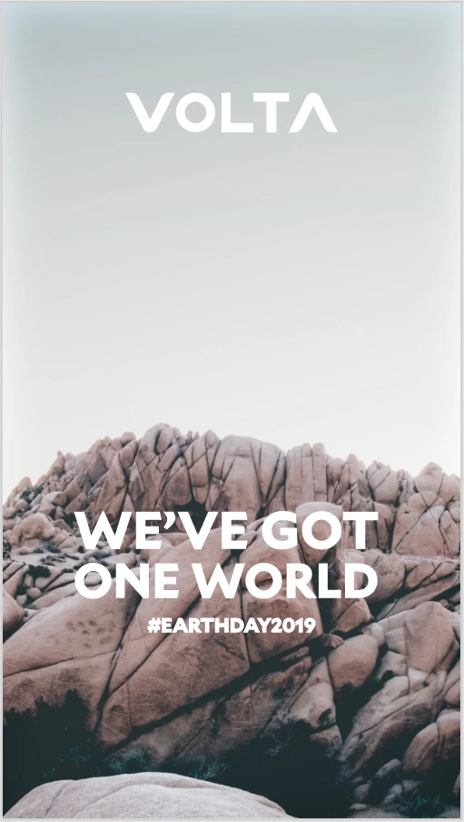 Volta Earth Day campaign artwork featuring pale desert rocks and the line We’ve Got One World