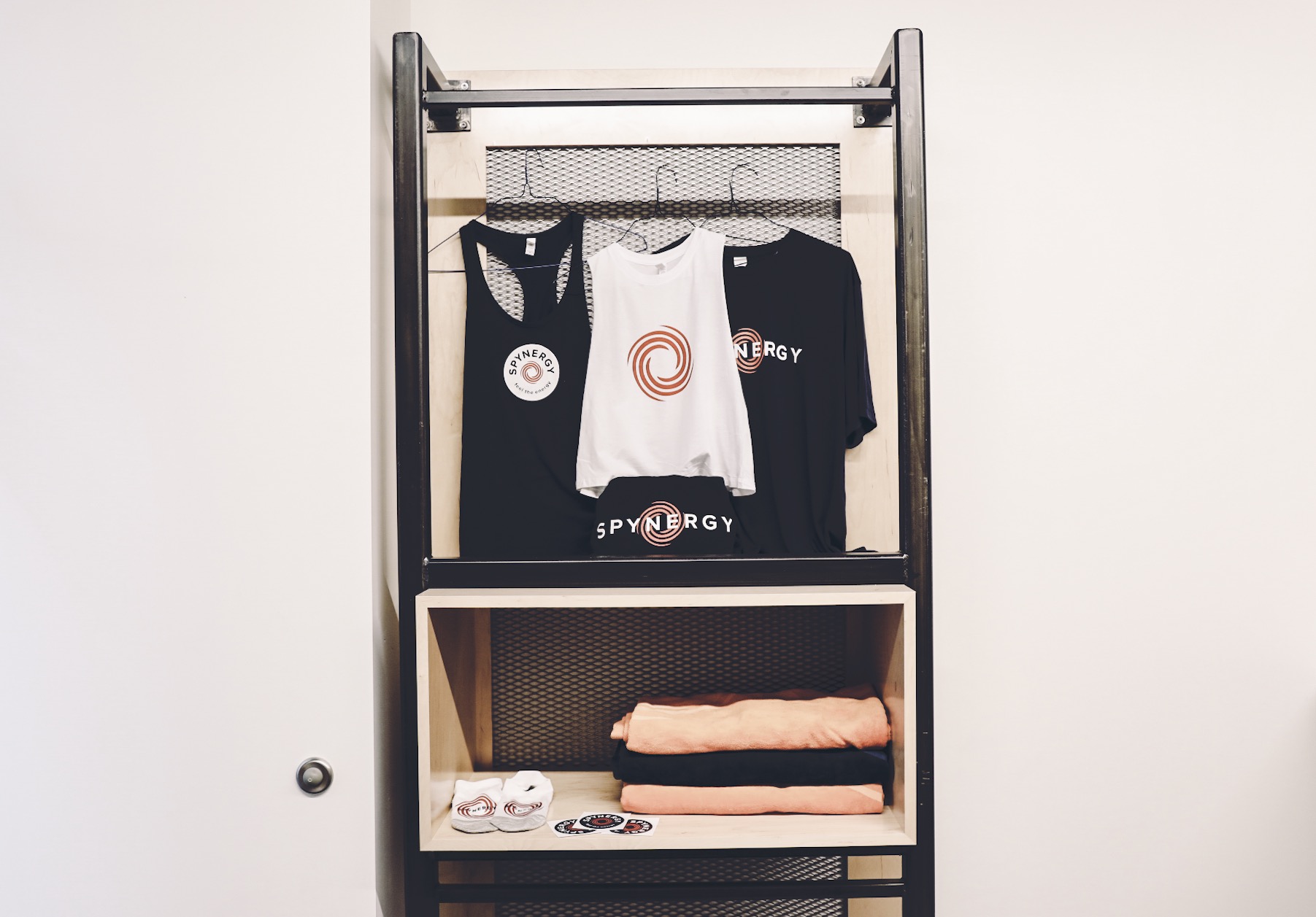 Spynergy studio merchandise and visual identity